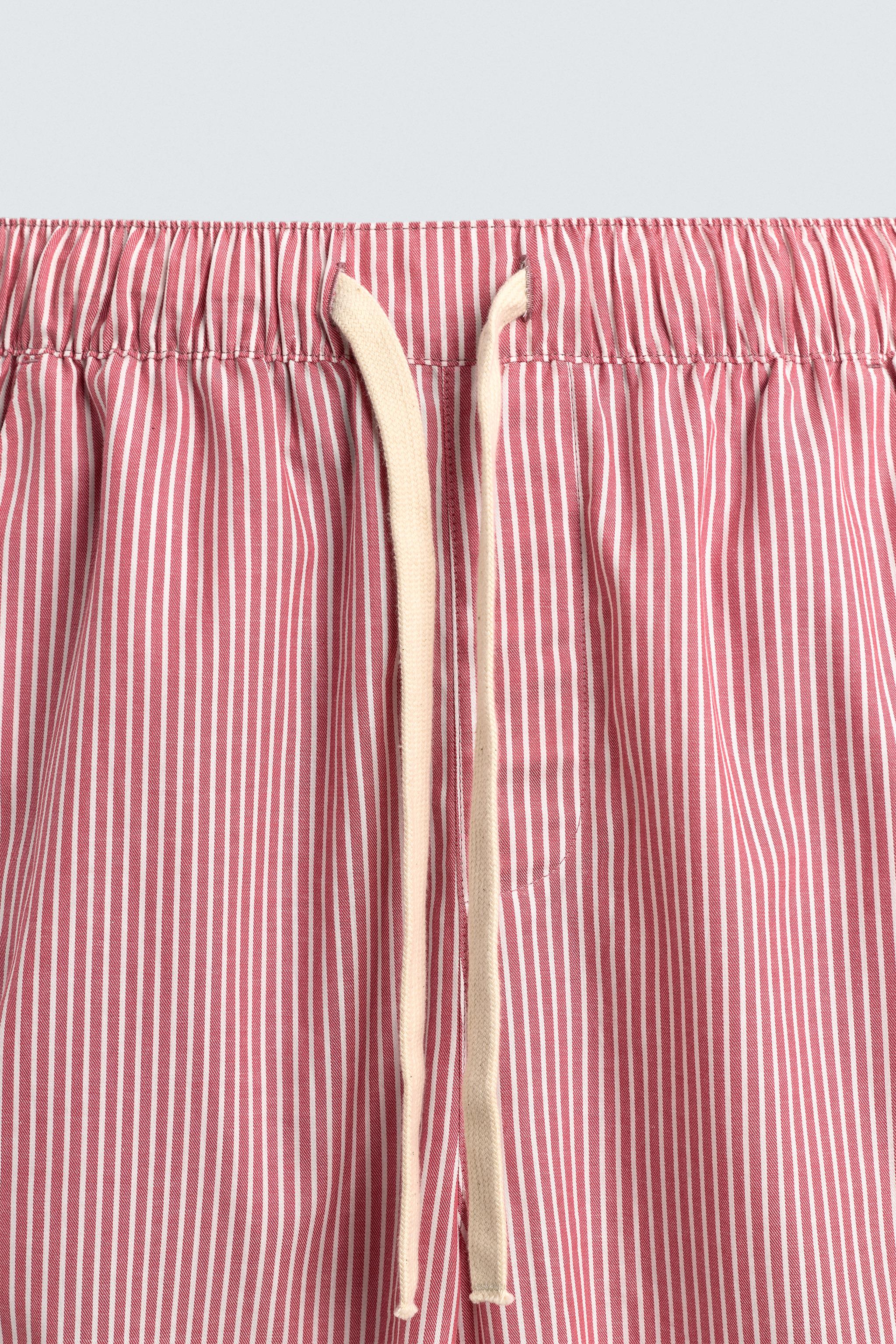 PANTALON À RAYURES ET BANDE EN CONTRASTE